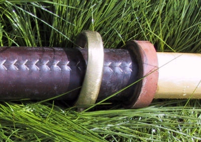 Oar with leather and button